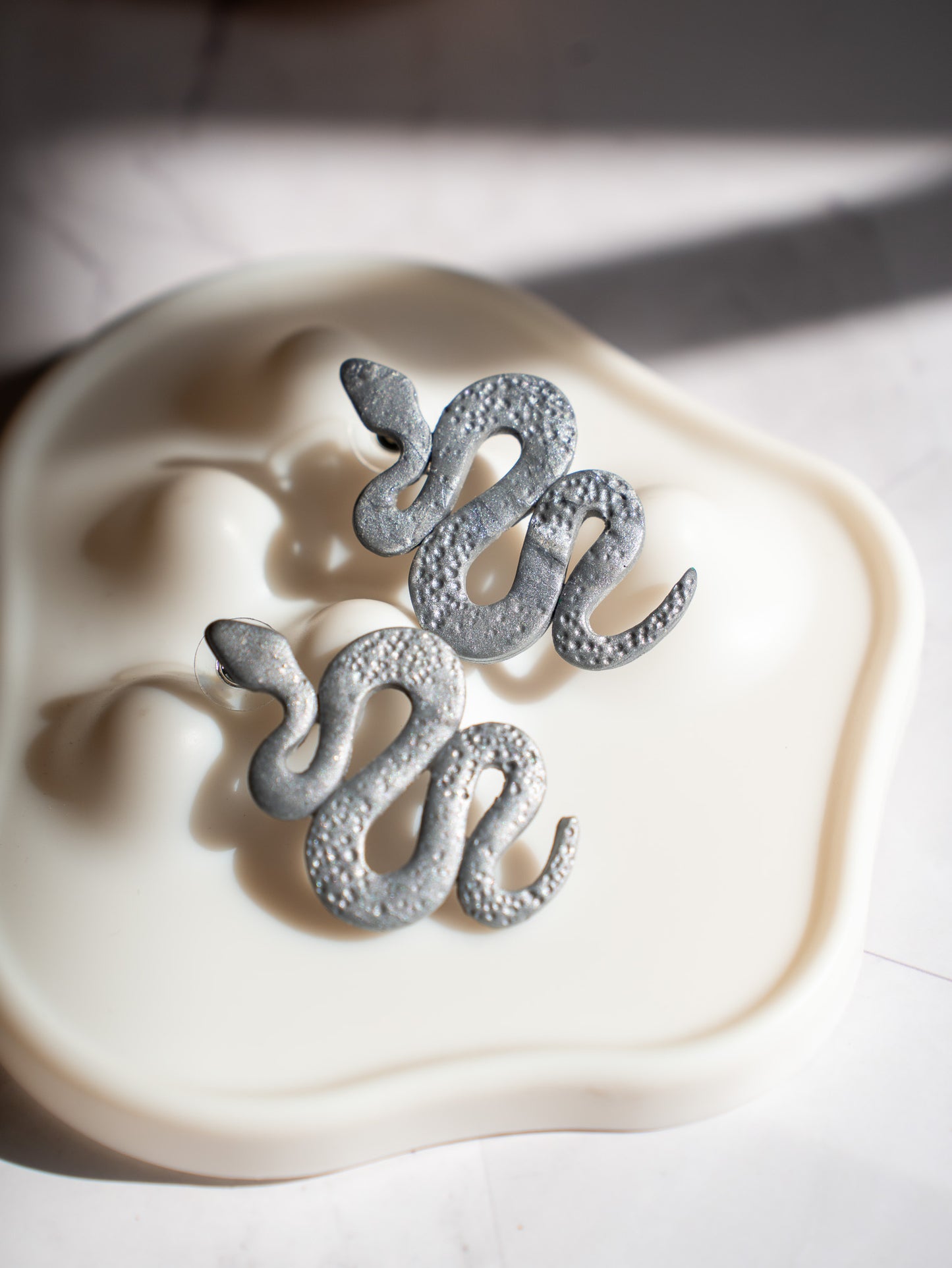 sliver snake earrings